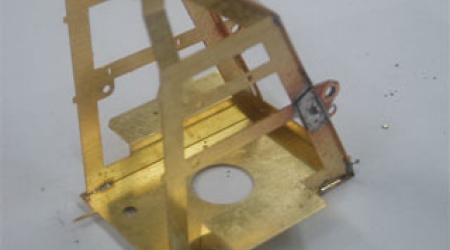 a: Start of Assembly ------ Fit together the side frames to the base.